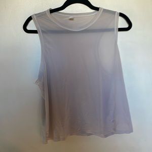 Athleta Ladies Large sheer tank top. Used, nice*. Beige. Machine wash.